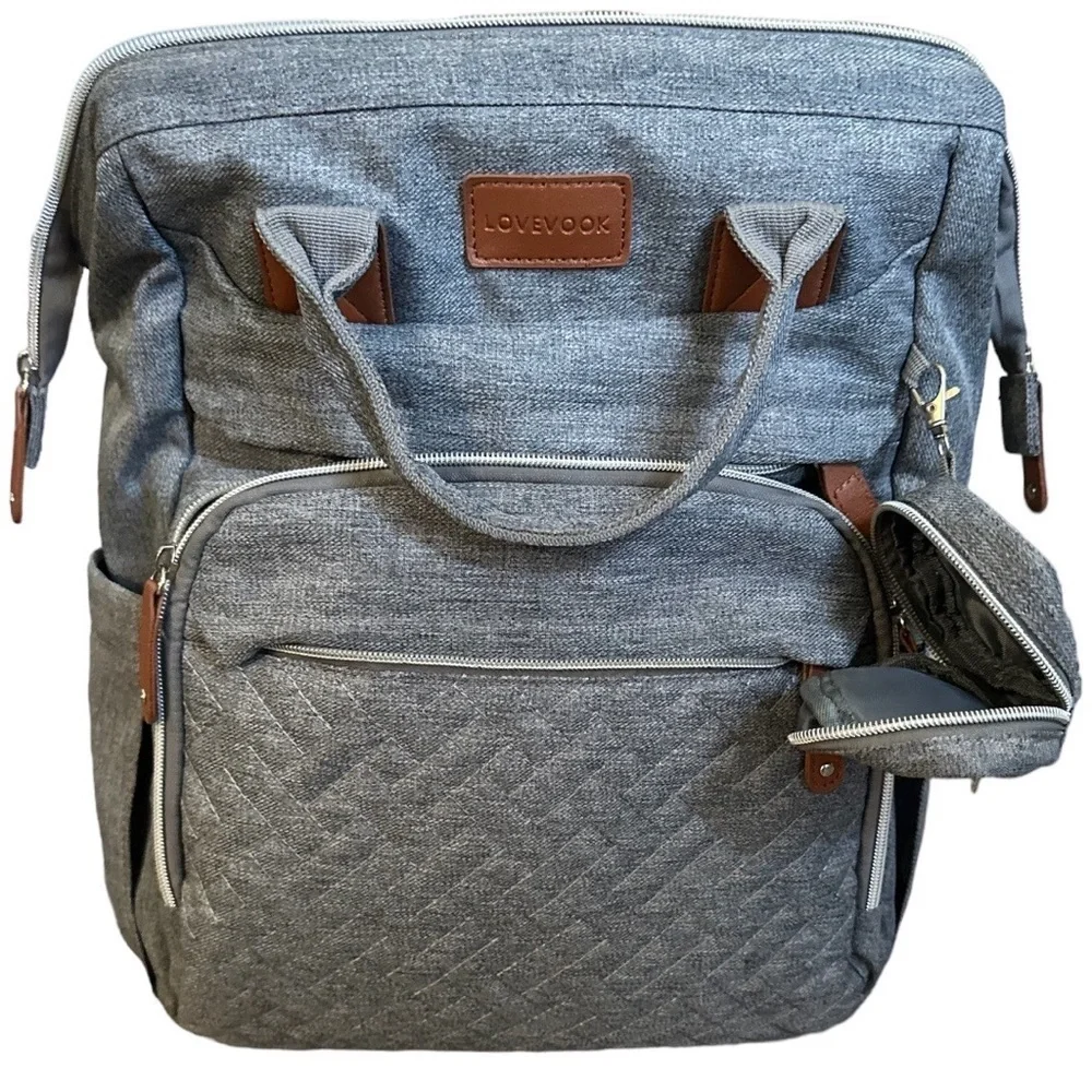 Boutique Large Diaper Bag, Backpack, Bassinet, Tech Charging Station all in one